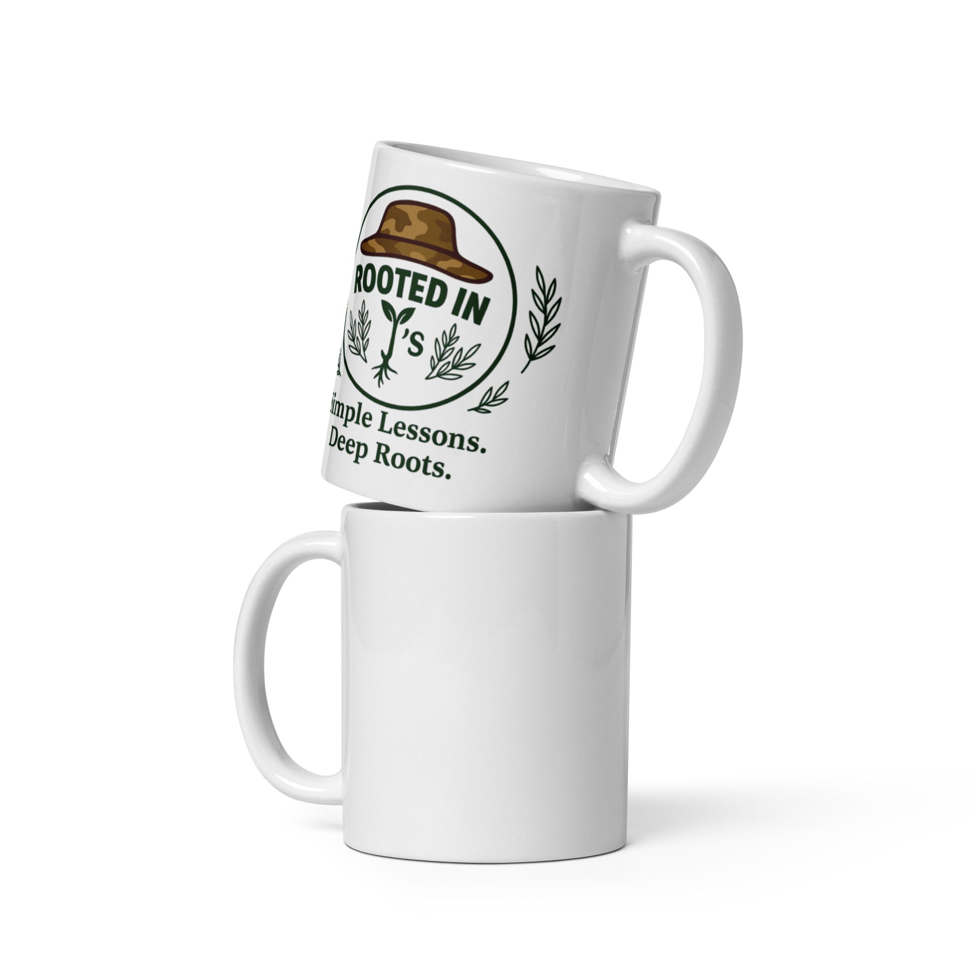 Mug  states Stay rooted. - Rooted In J's